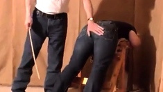 Caned over tight jeans Daddy boy