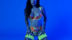 MILF slips out of her sexy neon lingerie