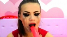 Cam girl face fucks and gags her self hard