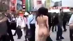 Walking semi-nude in Tokyo Streets