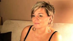 short haired german mature with big tits on her webcam